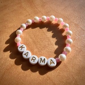 - Taylor Swift KARMA bracelet | Midnights album inspired beaded Swiftie pink